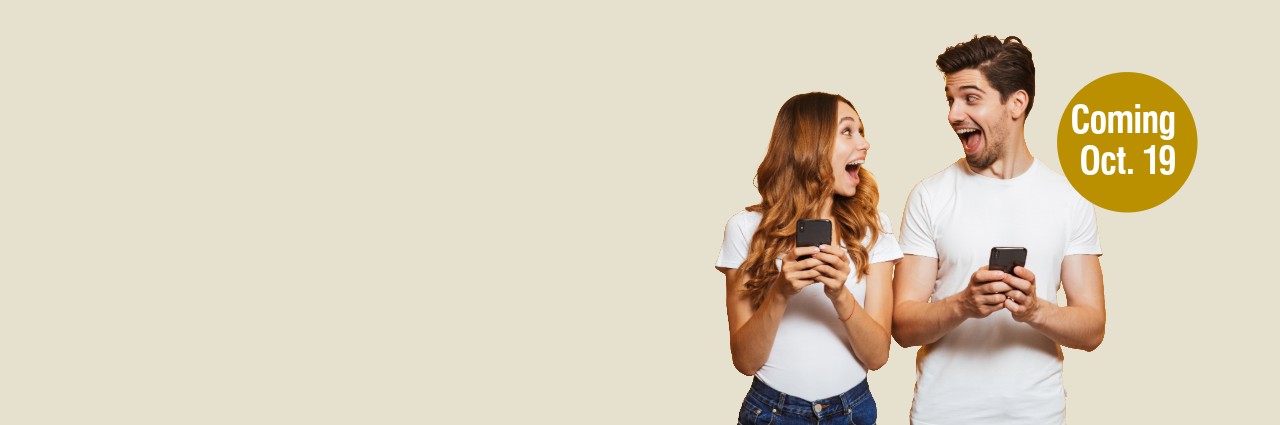 woman and man looking at phones